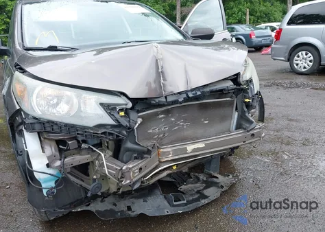 2014 Honda Cr-V Lx z USA, uszkodzony, nr VIN 2HKRM4H32EH622272